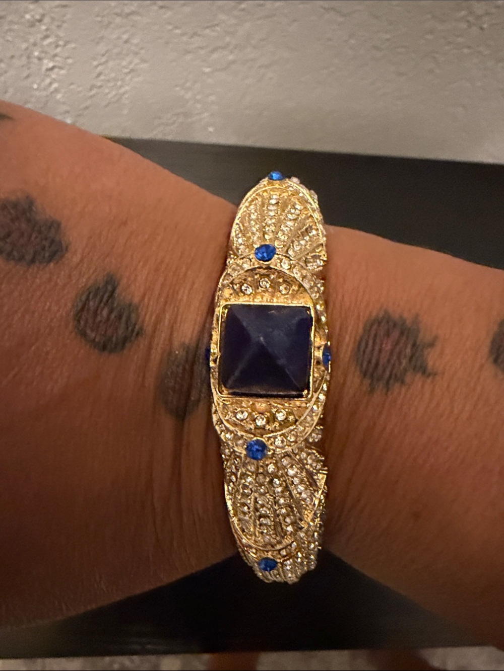 Chunky Gold-Tone Bracelet with Deep Blue Center Stone - Women's Jewelry